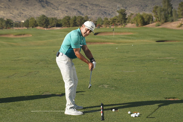 How to Stop "Hanging Back" and Finish Your Swing with Power